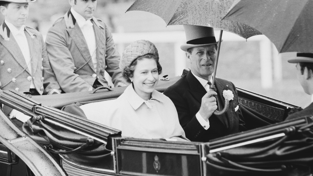 Queen Elizabeth II and Prince Philip in a car