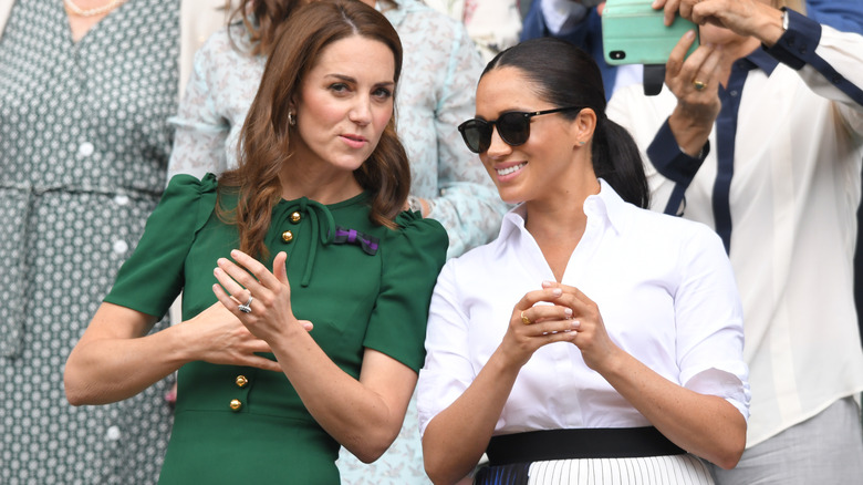 Kate Middleton and Meghan Markle at Wimbleton watching a tennis match