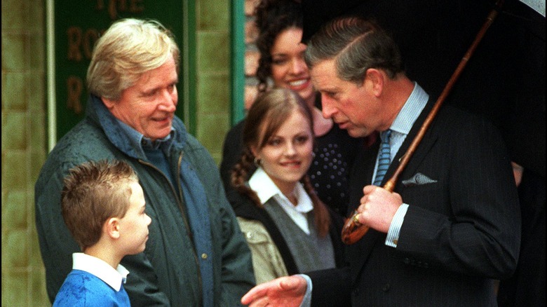 Prince Charles greets cast members of Coronation Street