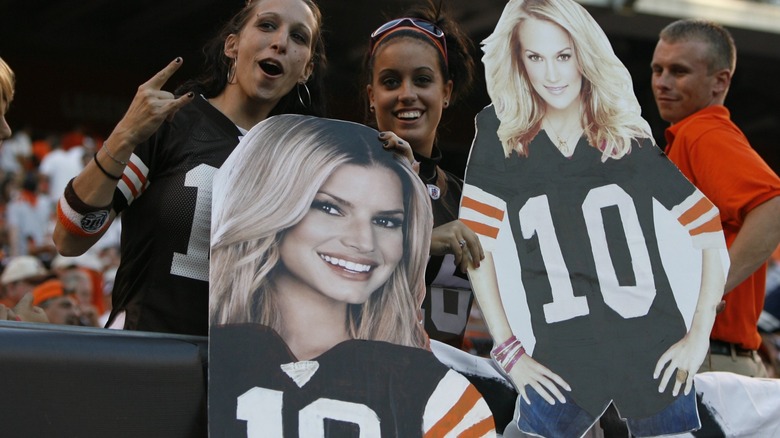 NFL fans with Jessica Simpson, Carrie Underwood cutouts