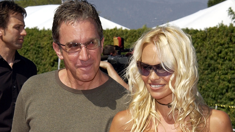 Pamela Anderson with Tim Allen, smiling