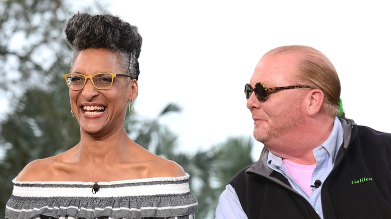 Carla Hall and Mario Batali laughing