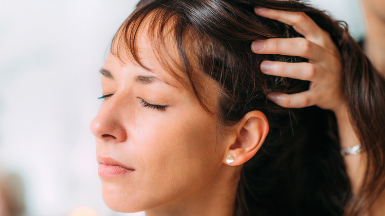 woman getting scalp massage