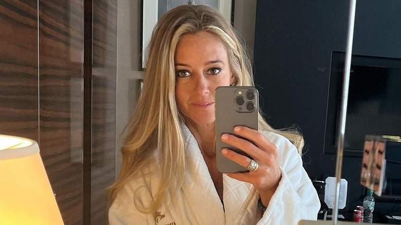 Nicole curtis taking a selfie in a bathrobe