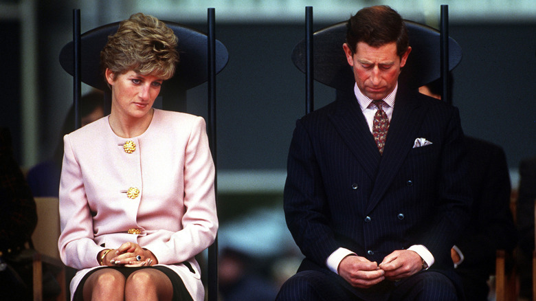 Princess Diana subtly smiling with King Charles