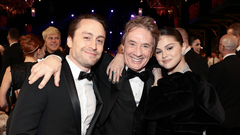 Selena Gomez poses with Kieran Culkin and Martin Short