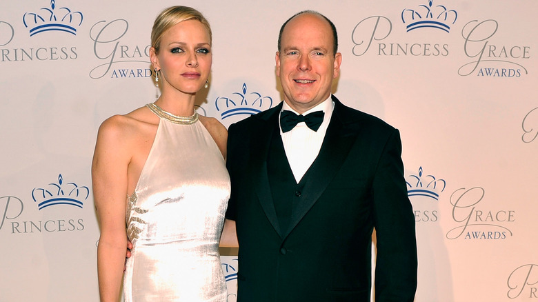 Princess Charlene and Prince Albert smiling