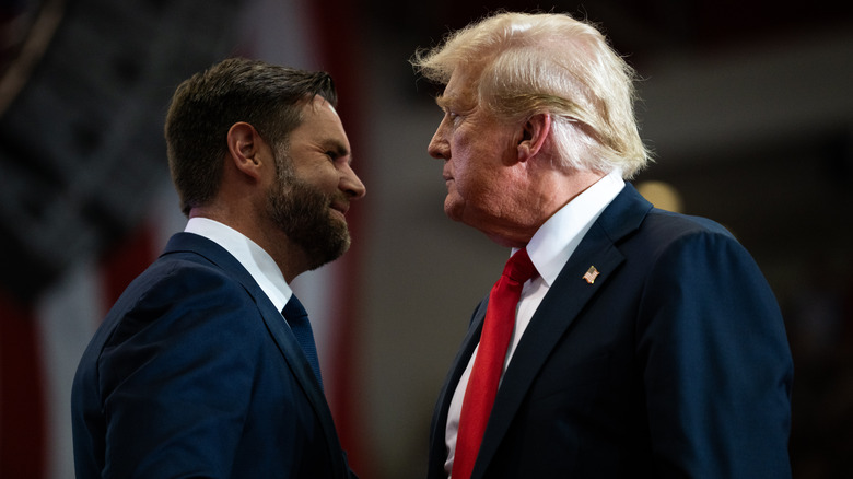 Donald Trump and JD Vance shaking hands