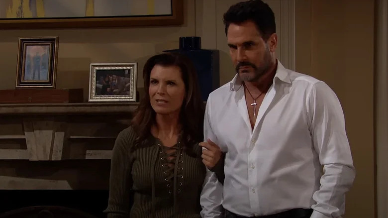 Kimberlin Brown and Don Diamont with locked arms