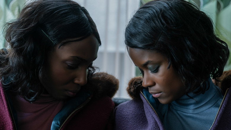 June and Jennifer putting their heads together in The Silent Twins