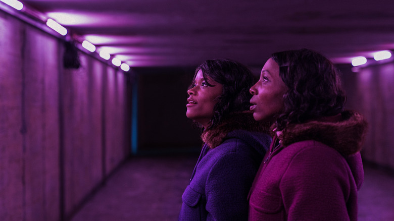 June and Jennifer under purple light in The Silent Twins