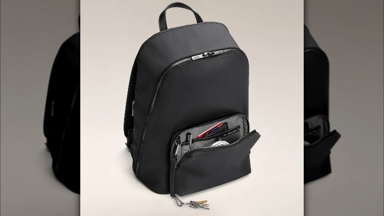 Away backpack with laptop section unzipped