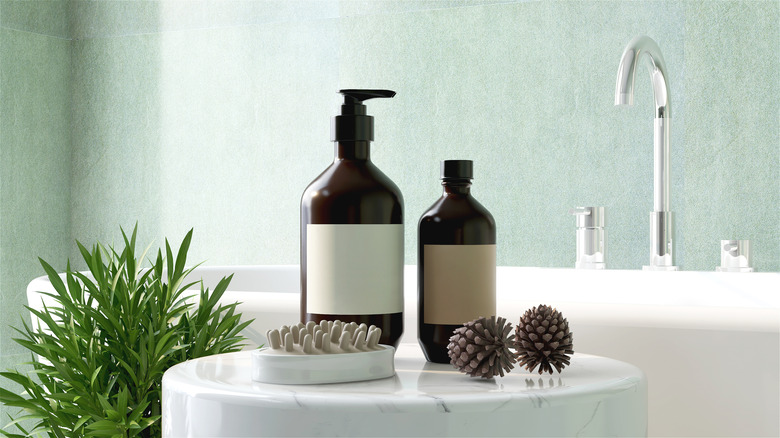 Beauty products resting on a sink