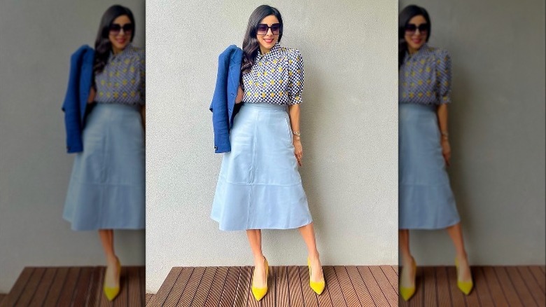 Woman in blue-and-yellow outfit