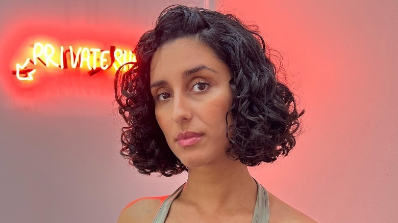 woman with curly bob haircut