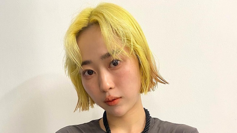 woman with yellow slob haircut