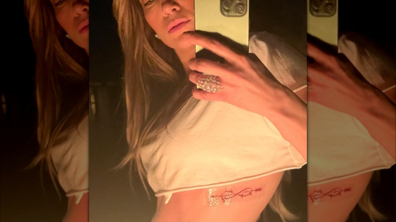 Jennifer Lopez selfie showing tattoo