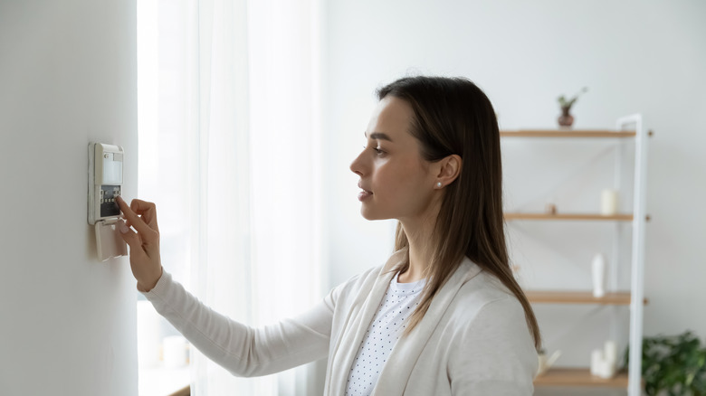 woman using smart home system