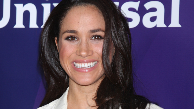 Meghan Markle poses for cameras