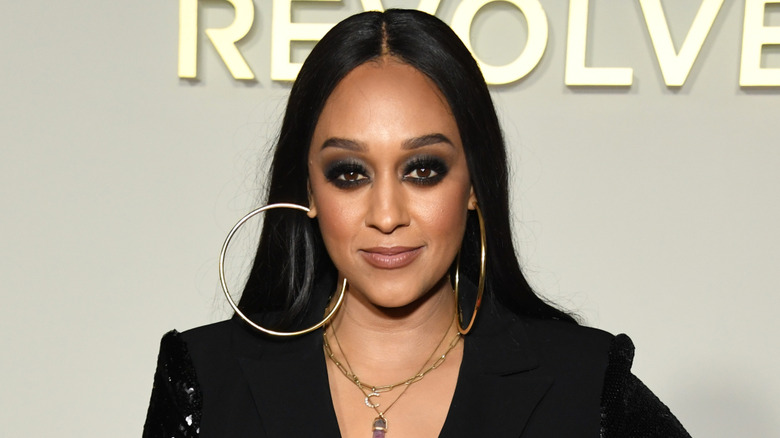 Tia Mowry poses on the red carpet