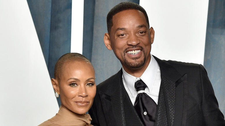 Jada Pinkett Smith and Will Smith posing