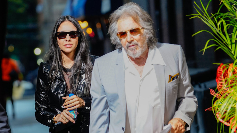 Noor Alfallah and Al Pacino walking