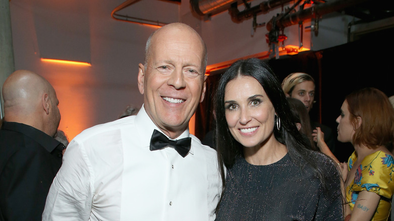 Bruce Willis and Demi Moore smiling