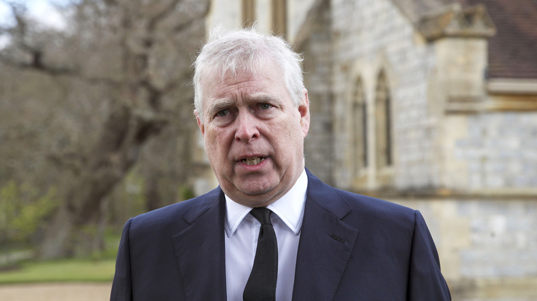 Prince Andrew frowning