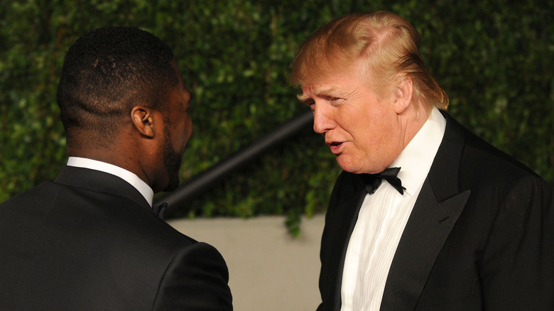 50 Cent shakes hands with Donald Trump