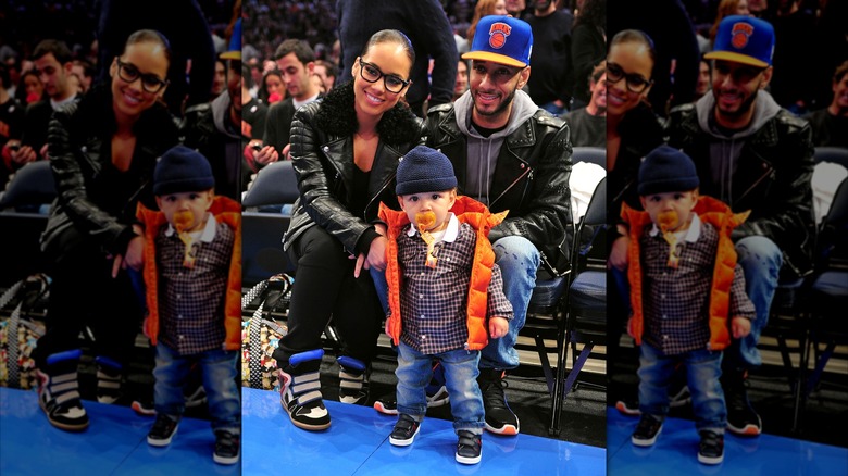 Alicia Keys, Swizz Beatz and Egypt Dean at a basketball game