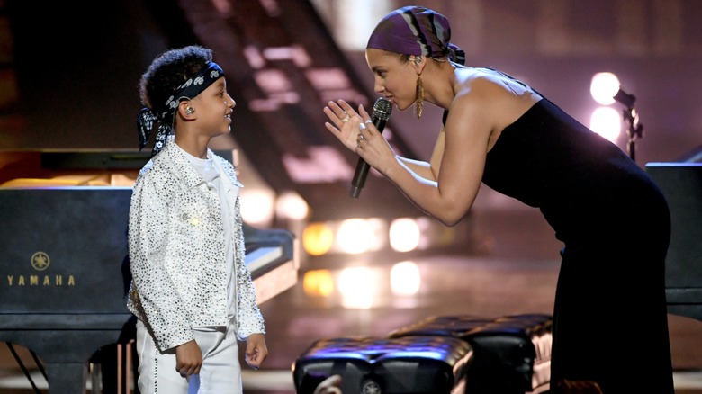 Egypt Dean on stage with Alicia Keys