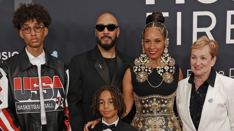 Swizz Beatz and Alicia Keys with their family