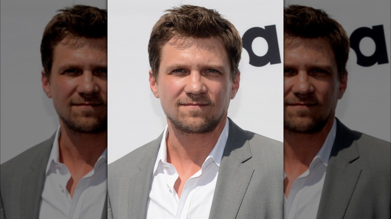 Marc Blucas posing at a USA network event in 2012