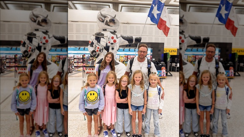 Adam Busby and his daughters