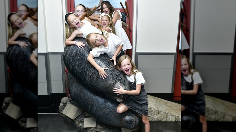 Busby daughters in King Kong's hand