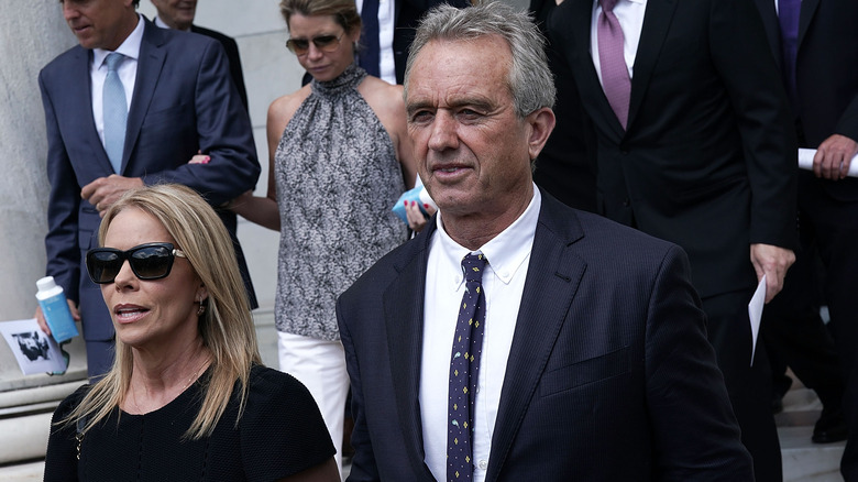 Cheryl Hines walking with Robert Kennedy Jr.