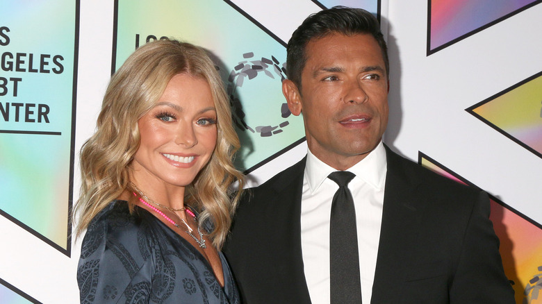 kelly ripa smiling with mark consuelos