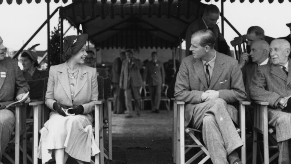 Queen Elizabeth and Prince Philip speaking