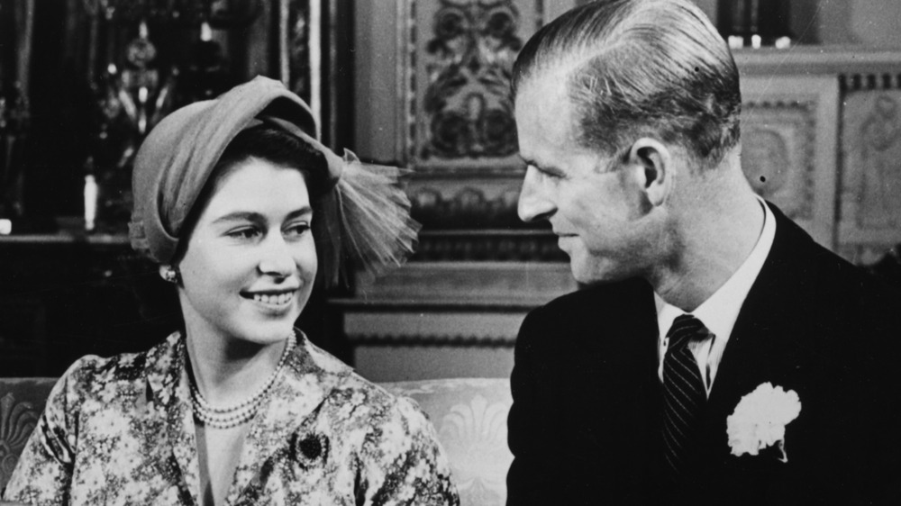 Queen Elizabeth and Prince Philip smiling