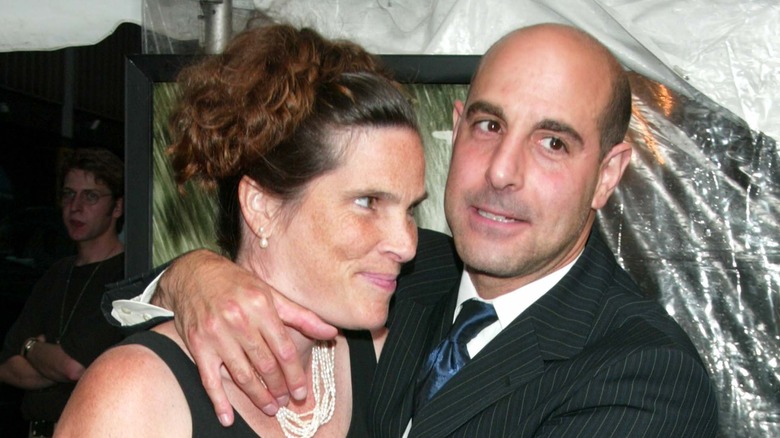 Stanley Tucci with arm around Kate Tucci