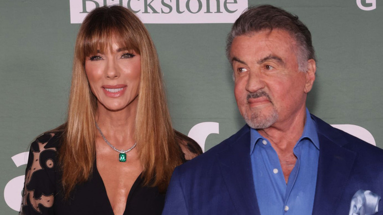 Jennifer Flavin and Sylvester Stallone posing