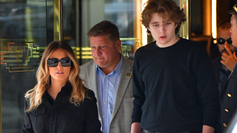 Melania and Barron Trump walking together