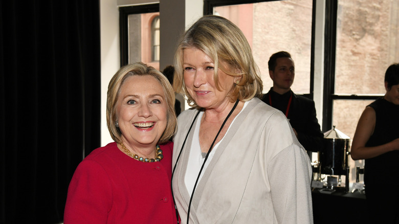 Hillary Clinton Martha Stewart smiling at an event