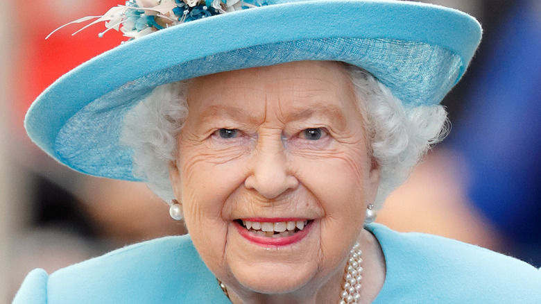 Queen Elizabeth smiling at an event