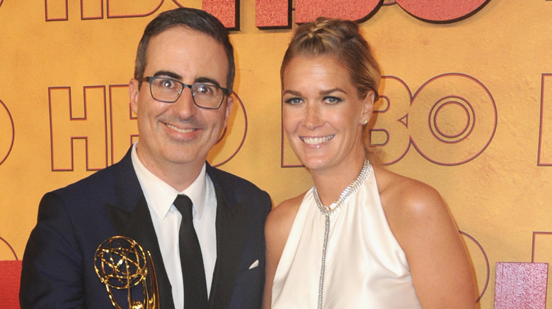 John Oliver and wife Kate Norley on the red carpet