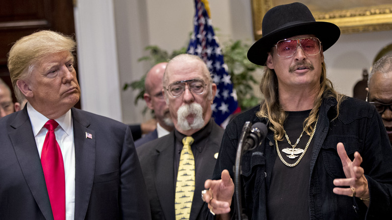 Donald Trump listens to Kid Rock speaking