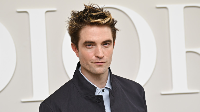 Robert Pattinson smirking