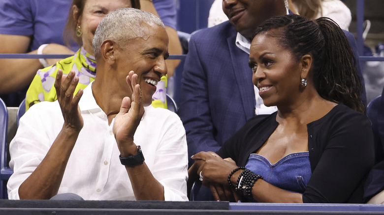 Michelle and Barack Obama sharing a look