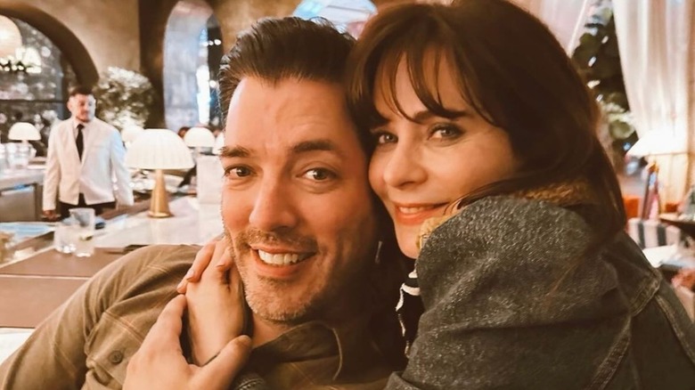 Jonathan Scott Zooey Deschanel smiling, hugging