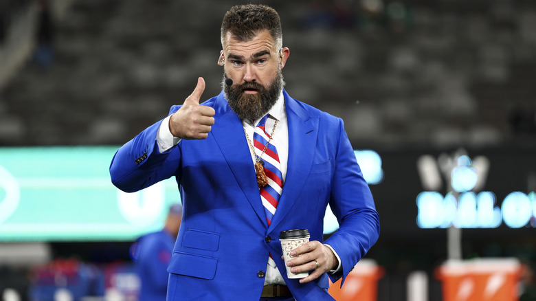 Jason Kelce blue suit giving thumbs up